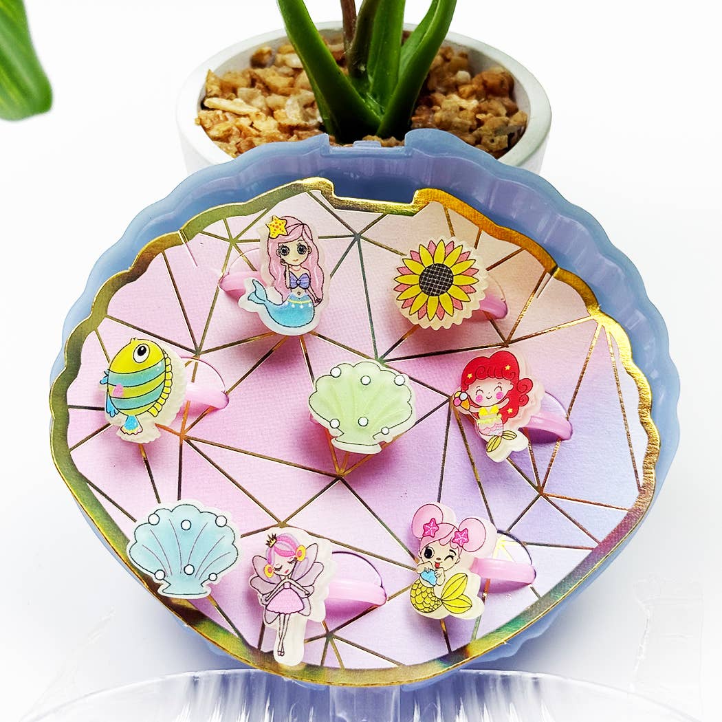 Girl Rings Toy in Shell Case